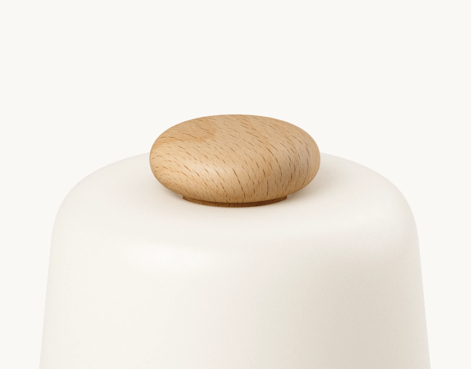 Closeup of top button on a Hatch Baby Beechwood