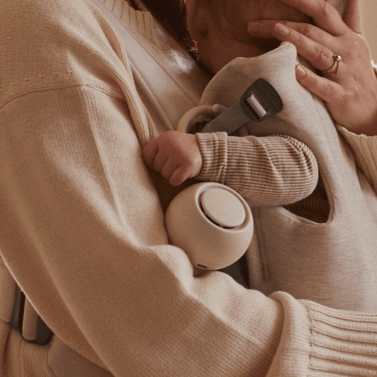 Hatch rest go in putty hanging from a baby sling carrier