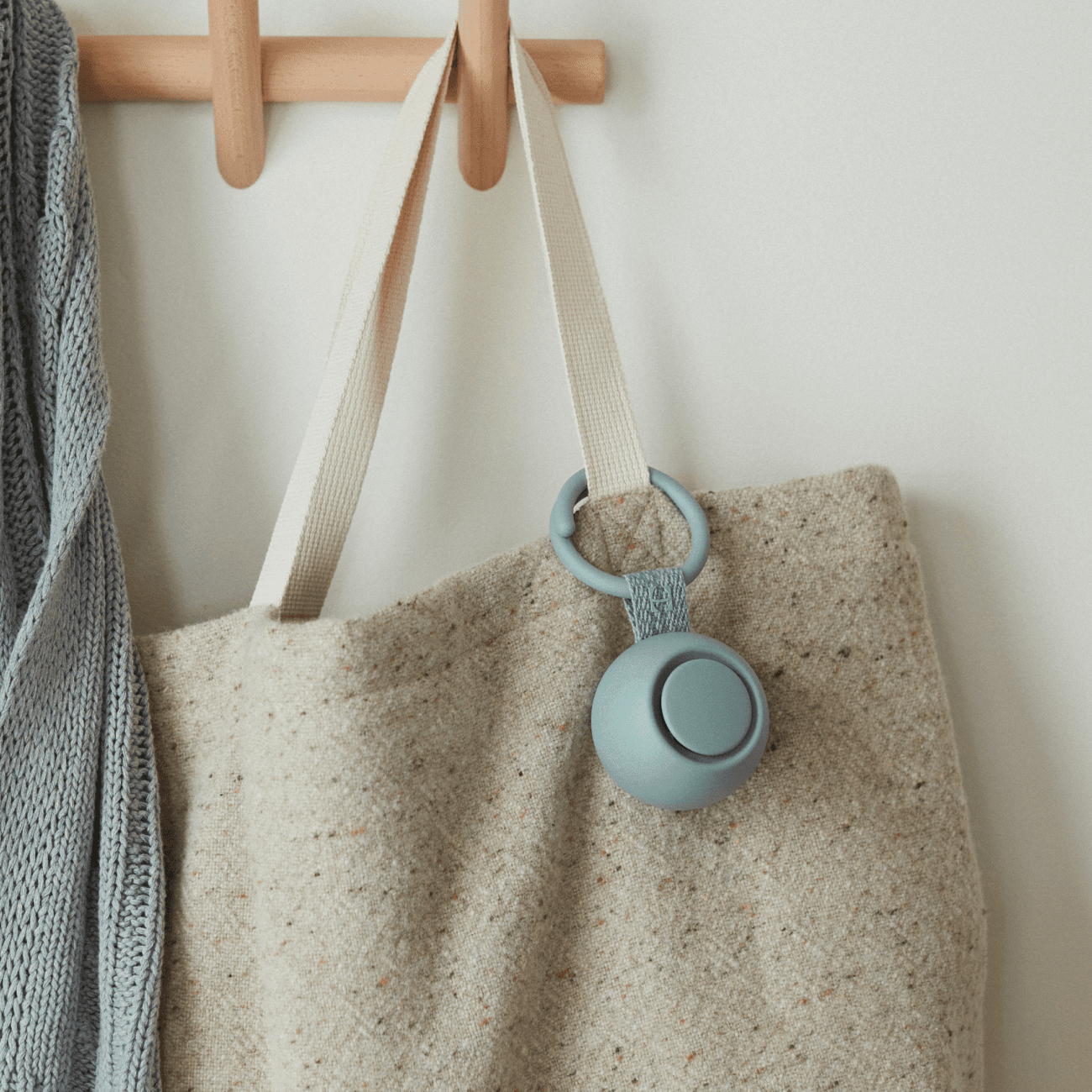 Hatch rest go in slate hanging on a tote bag