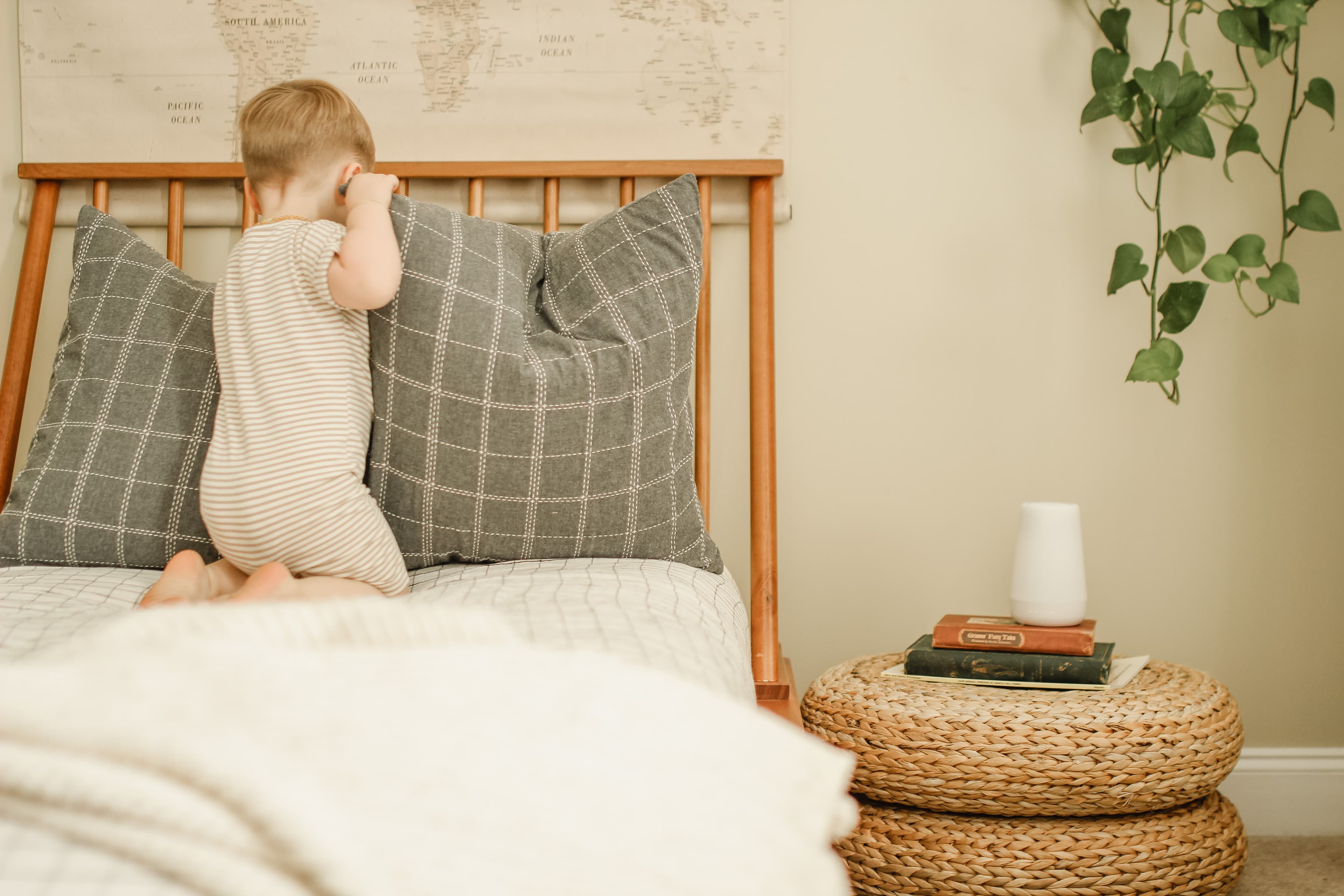 Baby playing on a bed