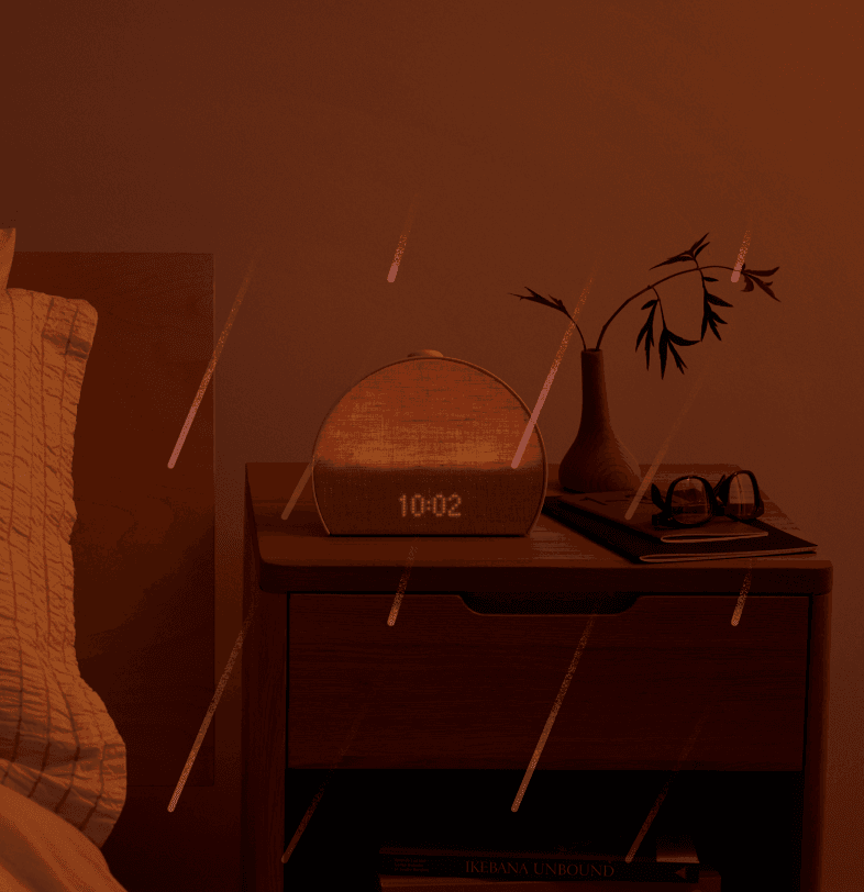 Restore 3 on a nightstand in the night with rain effects surrounding it
