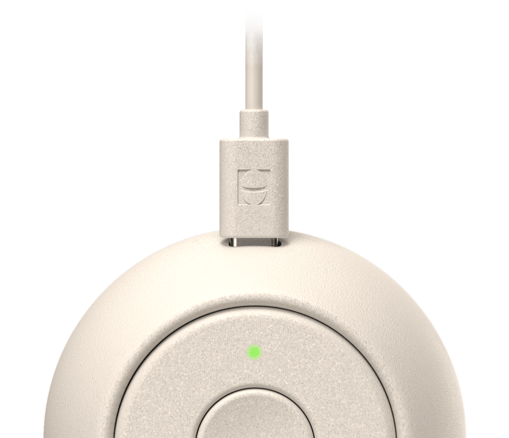 Closeup of Hatch Go putty colorway with included charging cable plugged in