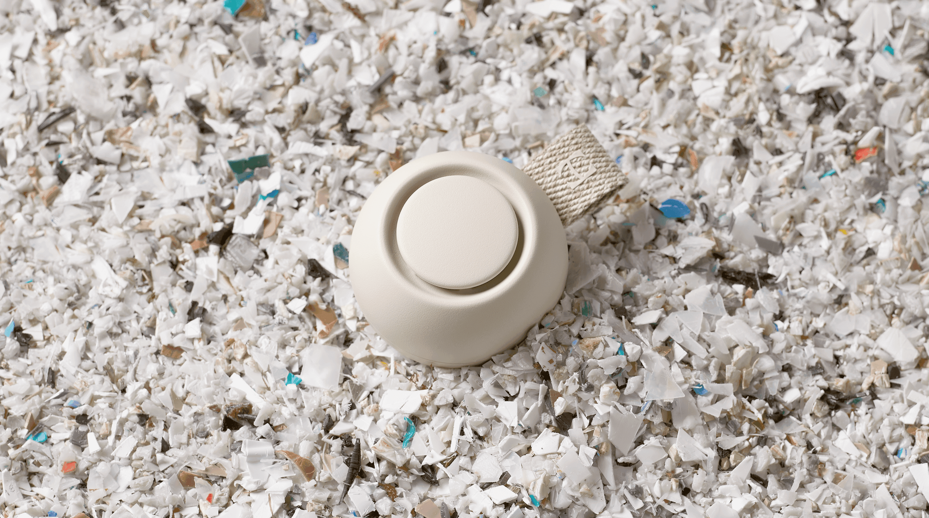 Hatch Go laying on a bed of recycled plastic scraps