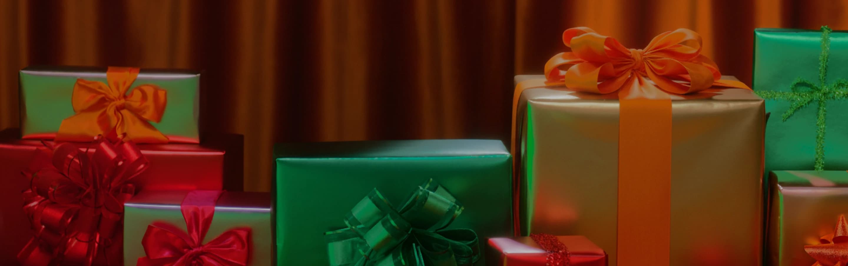 A set of wrapped gifts with bows together