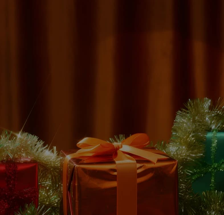 A set of wrapped gifts with bows together