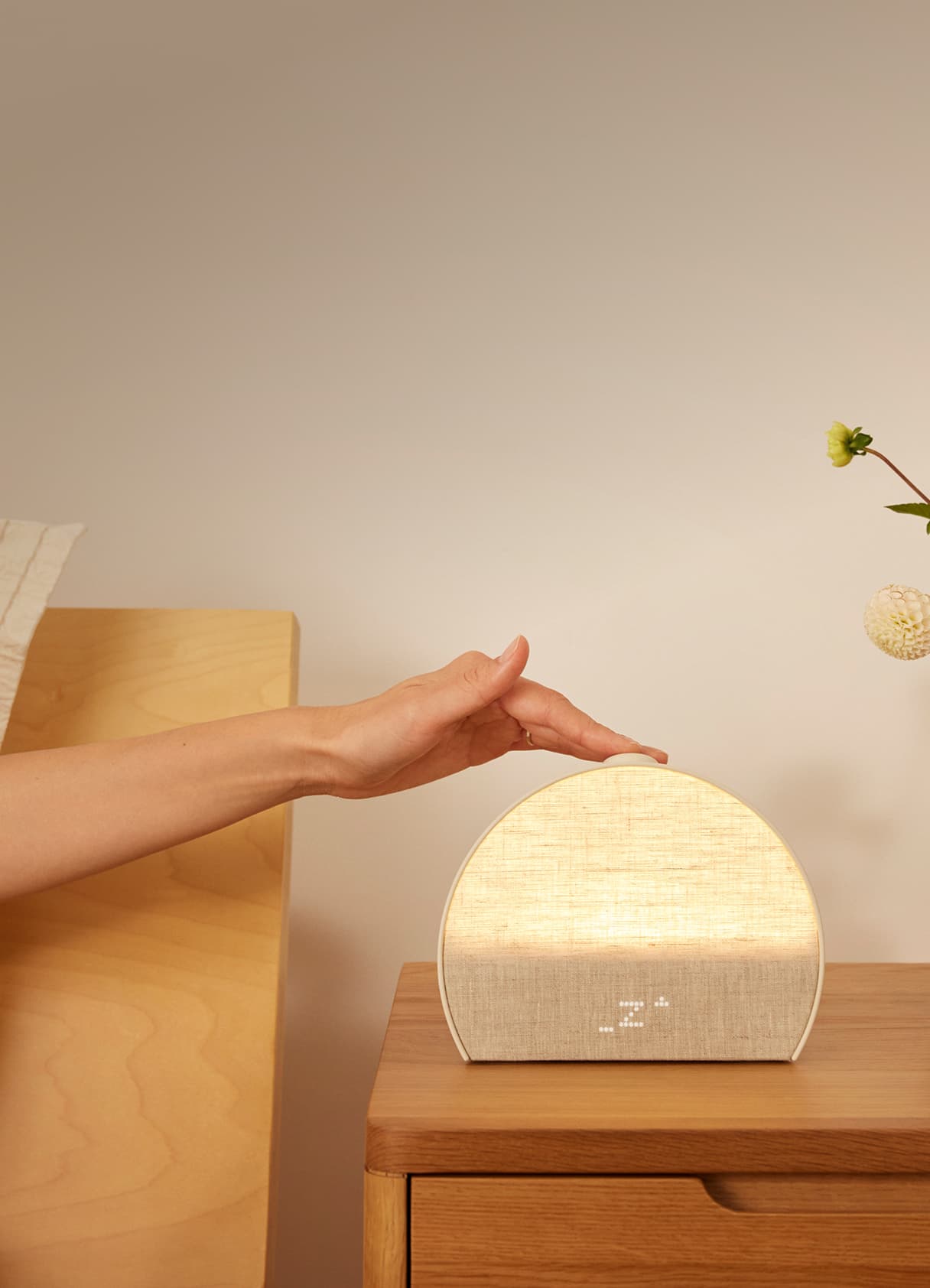 hand pressing Restore button