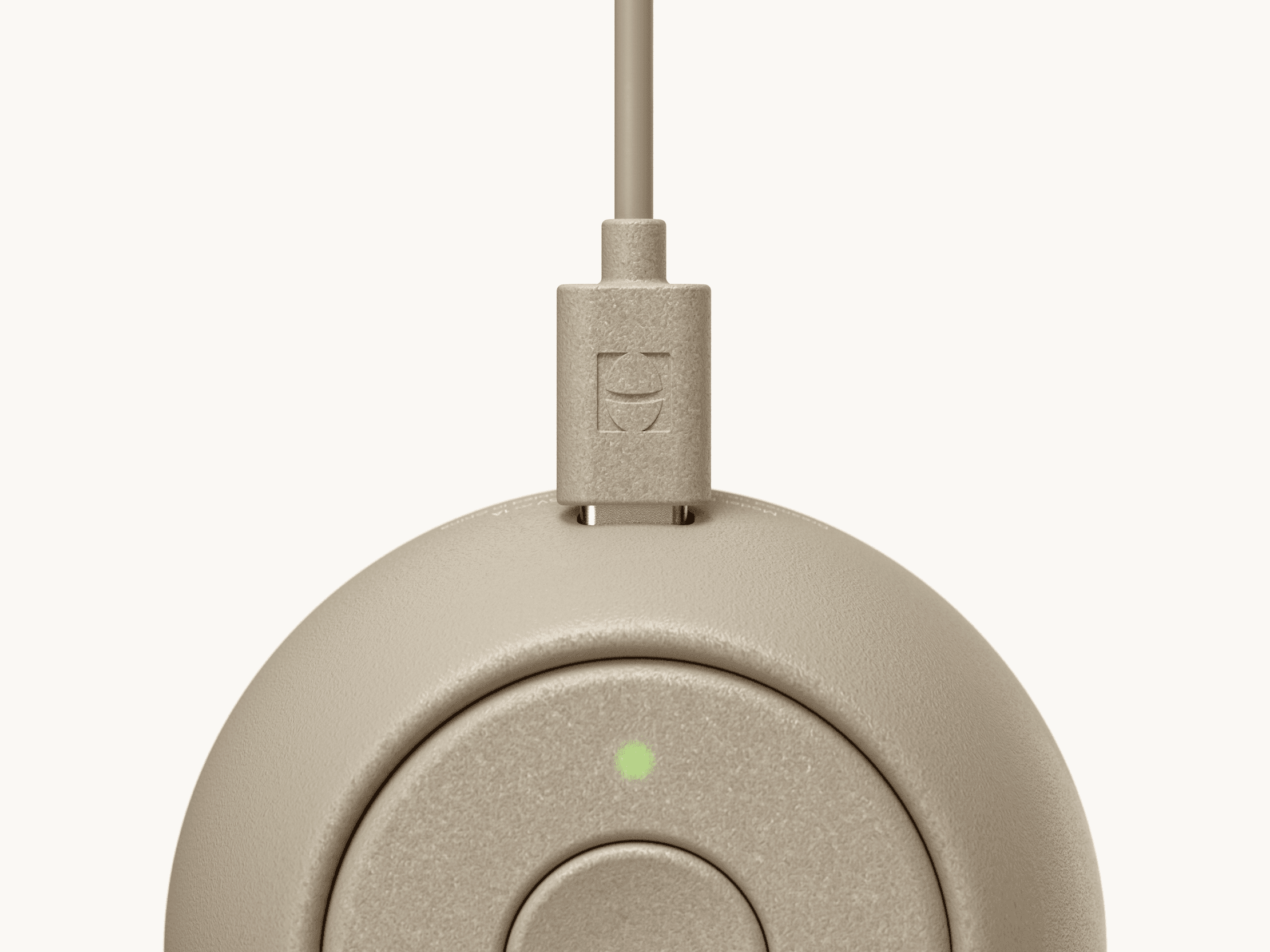 Hatch Go greige colorway with included charger plugged in