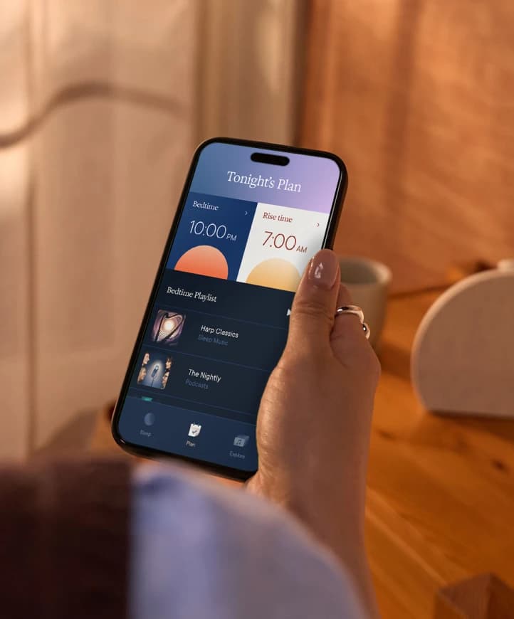 Someone using the Hatch Sleep app on their phone